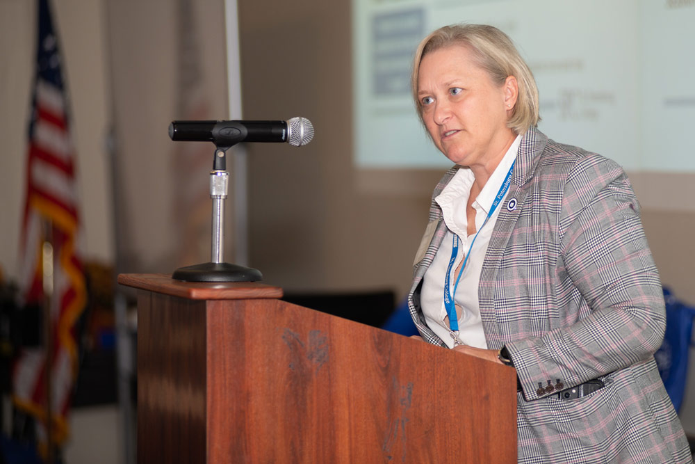 woman at podium speaking